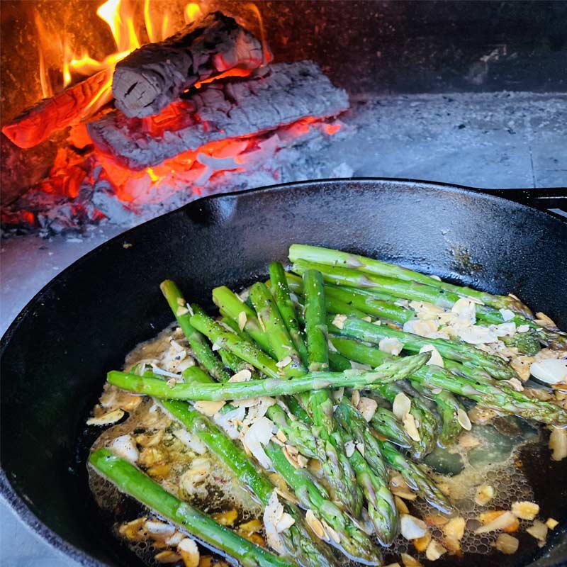 Asparagus cooking over fire