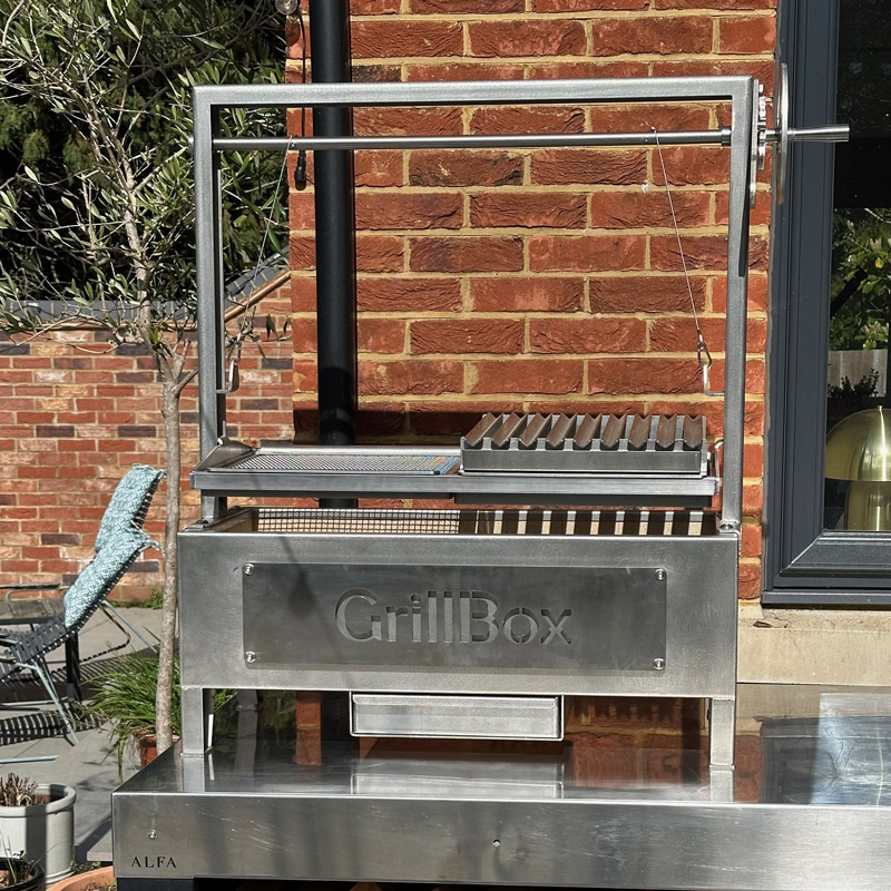 Asado cooking on the GrillBox